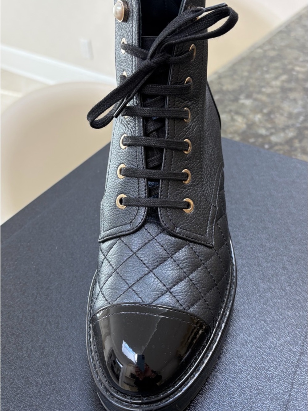CHANEL Black Quilted Leather Lace-Up Ankle Boot with Patent Toe